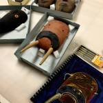 A drawing (right) by Susan Ringstad Emery depicts ceremonial walrus and raven masks she studied at the Anchorage Museum.