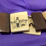 Susan Ringstad Emery believes this scrimshaw bracelet with squares etched and inked with images of a sailboat, owl, and person with a spear or harpoon, was made by her grandfather. His initials, T.S., are on the bracelet.