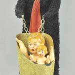Christmas celebrations were very different centuries ago. There was a gift-giving Santa and a devil punishing children, drunken men chasing people, and coal for bad children. Krampus, this strange man, was to be feared. He took bad children away. This figure is a 19th century version of the horned devil. He sold for $1,600. (Cowles Syndicate Inc.)