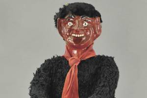 Devilish Krampus figure holds a basket of naughty children