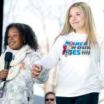 Yolanda Renee King, granddaughter of Martin Luther King Jr., left, accompanied by Jaclyn Corin, a student at Marjory Stoneman Douglas High School in Parkland, Fla., and one of the organizers of the rally, right, speaks during the March for Our Lives rally in support of gun control in Washington, Saturday, March 24. (AP Photo/Andrew Harnik)