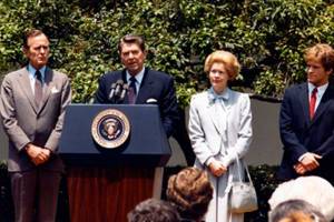 President Ronald Reagan presents the Presidential Medal of Freedom posthumously to Henry M. Scoop Jacksons family in 1984. Left to right are Vice President George H.W. Bush, Helen Jackson and Peter Jackson. (Courtesy of The Henry M. Jackson Foundation)