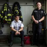 Everett Fire Department Capt. Nick Adsero (left) and firefighter Brent Duckworth braved smoke and flames to save 3-year-old twin sisters Chloe and Emma Orick on Jan. 29 at an Everett apartment. They are recipients of a Red Cross Fire Rescue Award. (Ian Terry / Herald File)