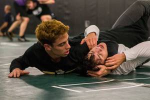 He throws people down and sews people clothes