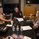 Mark Brinkman, Maury Eskenazi and State Farm agent Teri Busch talk during annual DUI radio show at the KRKO radio office in Everett. (Olivia Vanni / The Herald)