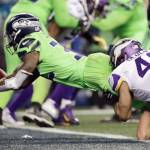 Seattles Chris Carson dives into the end zone for a touchdown in the fourth quarter of the Seahawks 21-7 win over Minnesota on Monday in Seattle. (AP Photo/Ted S. Warren)