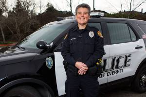 2 squad cars, 2 officers, a pillowcase and a cardboard box