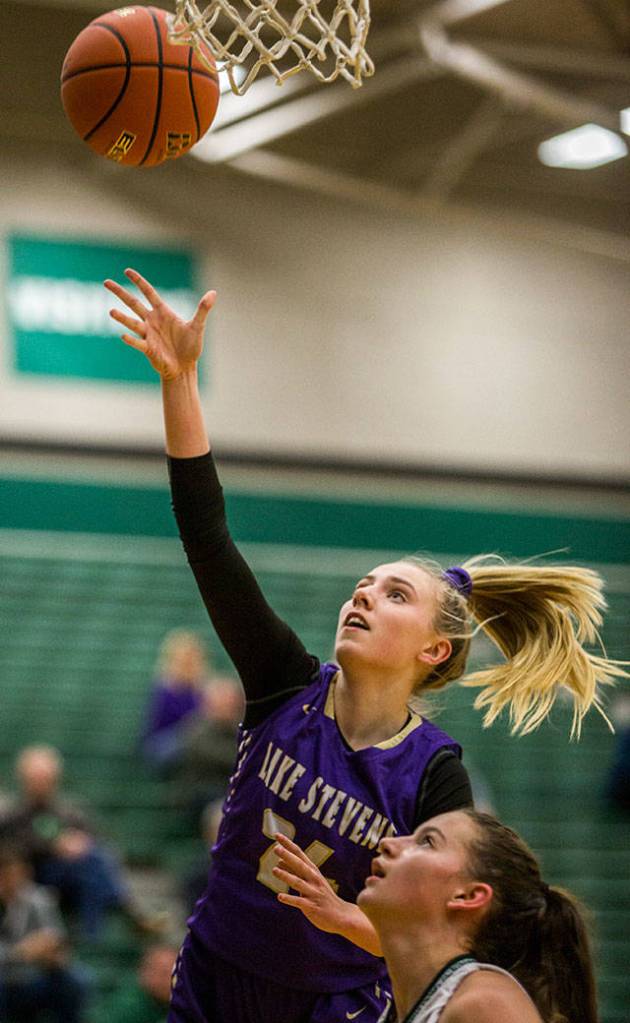Lake Stevens Chloe Pattison attempts a layup during Tuesdays game in Mill Creek. (Olivia Vanni / The Herald)