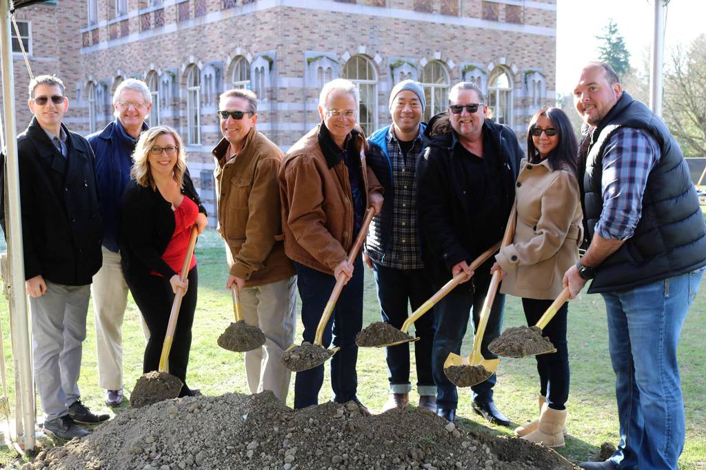Kevin Daniels smiles with members of the Bothell Kenmore Chamber of Commerce at the ceremonial groundbreaking for the Lodge at Saint Edward Park on Dec. 7. (Katie Metzger / Bothell-Kenmore Reporter)