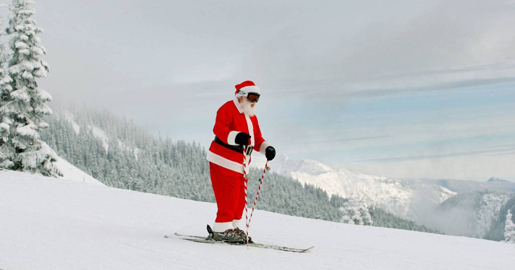 Don Bryant starts down a run from the top of the Tye Mill lift in 2009. Hes been dressing as Santa for the past 25 years at Stevens Pass. (Michael OLeary / Herald file)