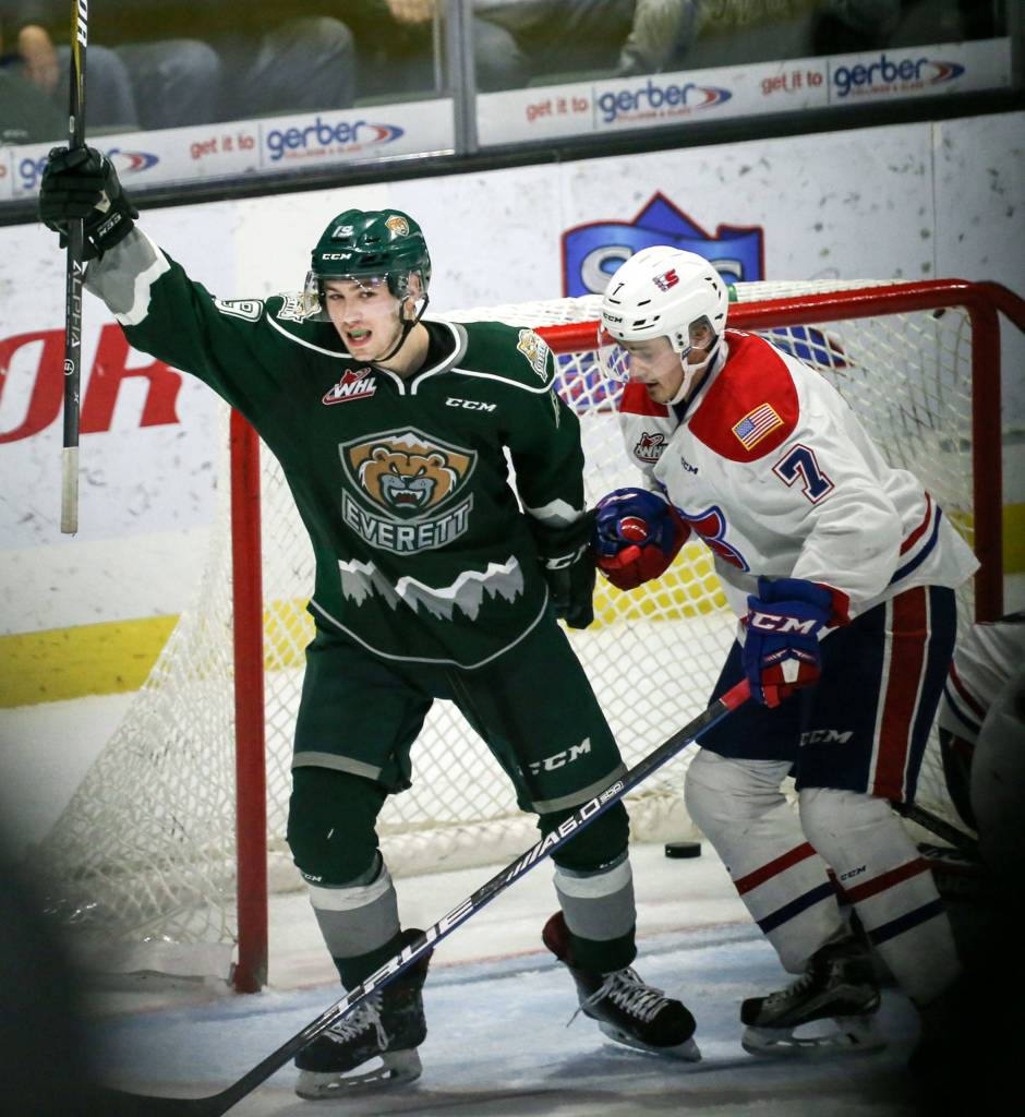 Silvertips <a href="https://www.heraldnet.com/sports/kindopps-two-goals-elevate-silvertips-to-ninth-straight-win/" target="_blank">Bryce Kindopp</a> celebrates his first of two goals with Chiefs Nolan Reid trailing in the final period at Angel of the Winds Arena in Everett on Dec. 9. Silvertips won 2-0. (Kevin Clark / The Herald)