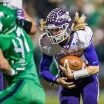 Lake Stevens Tre Long runs the ball Nov. 24, during the Class 4A state state semifinal game against Woodinville at Pop Keeney Stadium in Bothell. (Olivia Vanni / The Herald)