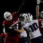 Snohomishs Carter Cole tries to block a pass by Squalicums Spencer Lloyd as Snohomish beat Squalicum 30-27 Oct. 26, at Veterans Memorial Stadium in Snohomish. (Andy Bronson / The Herald)