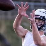 Evan Mannes eyes the incoming pass during practice Oct. 4, at Glacier Peak High School in Snohomish. (Kevin Clark / The Herald)