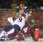 Washington running back Myles Gaskin (9) dives into the end zone as hes tackled by Washington States Marcus Strong during the third quarter of an NCAA college football game Nov. 23 in Pullman. (Joshua Bessex / The News Tribune file)