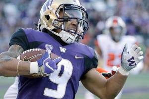 Lynnwood couple cheer on son, UW running back Myles Gaskin