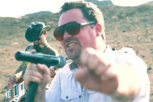 Frontman Steve Antonsen of Bothells Colossal Boss sings in the bands new Thinkin and Drinkin music video. Fraser Midstokke, on the bass, is in the background. (YouTube)