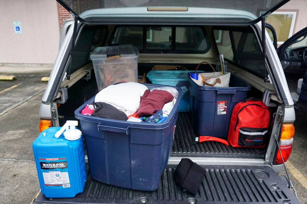 VashonBePrepared President Vicky de Monterey Richoux keeps several bins with supplies in the back of her car. (Melissa Hellmann / Seattle Weekly)