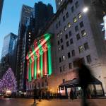 The New York Stock Exchange is shown bathed in holiday light. (AP Photo/Mark Lennihan, File)