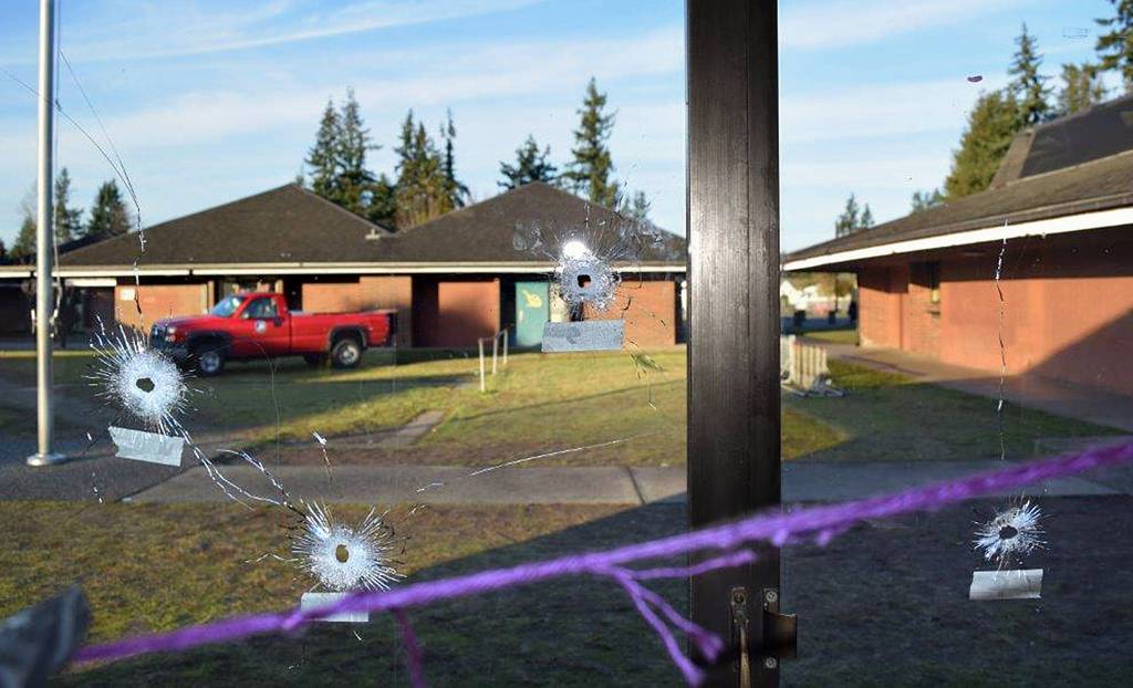 Students returning from winter break found dozens of bullet holes in the windows of Marysvilles Pinewood Elementary School. Cmdr. Mark Thomas of the Marysville Police Department said the damage was done between 11:55 p.m. New Years Eve and 12:20 a.m. on New Years Day, when people would have been lighting off fireworks. (Photo Courtesy Marysville Police Department.)