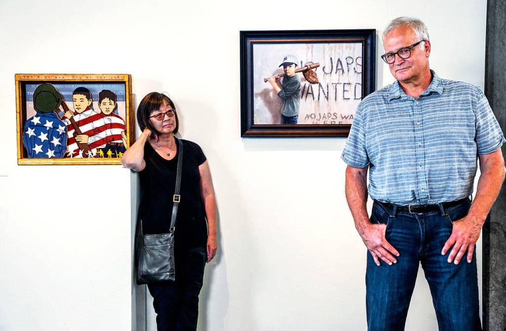 Works of Jan and Chris Hopkins convey some of historys most powerful Japanese-American stories through their mastery of illustration. The couple, whose work is currently on display, are the 2018 Schack Art Centers Artists of the Year. (Dan Bates / The Herald)