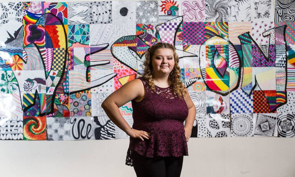 Weston High Macie Bailey loves her schools spirit she says, on Dec. 4 in Arlington. (Andy Bronson / The Herald)