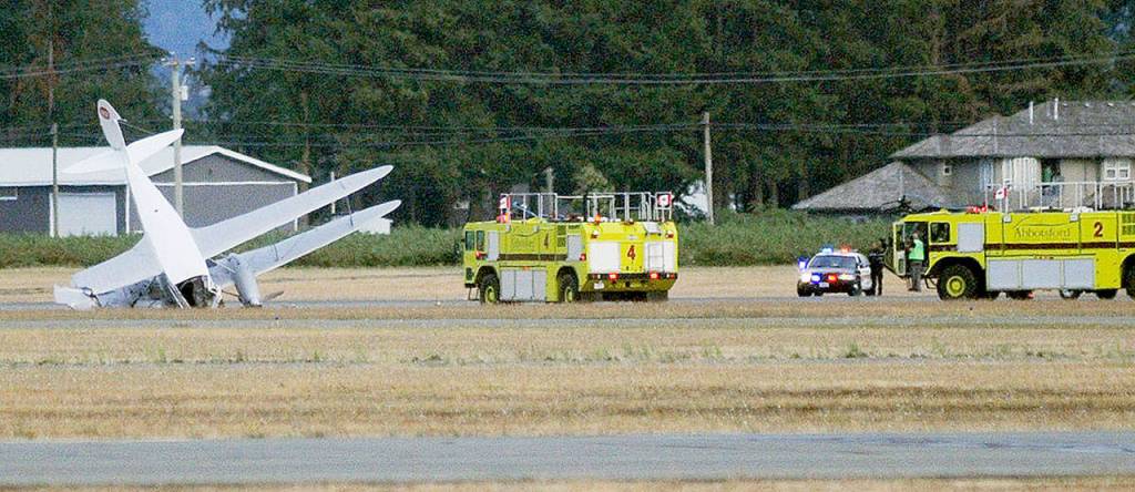 The Historic Flight Foundations de Havilland Dragon Rapide after it crashed at the Abbotsford International Airshow in British Columbia, on Aug. 11, 2018. (John Morrow / Abbotsford News)