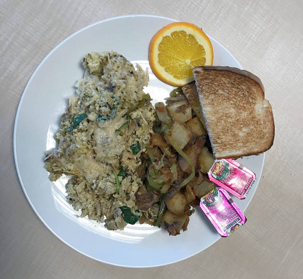 The Joes Special, a scramble with Italian sausage and spinach, at Totem Family Diner in Everett. (Mark Carlson / The Herald)