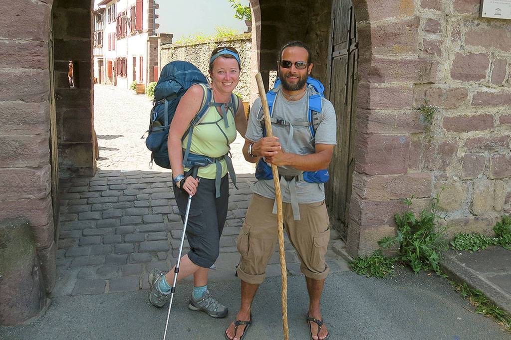 Beth and Eric Jusino pause at the gate to St Jean Pied de Port. (Beth Jusino)
