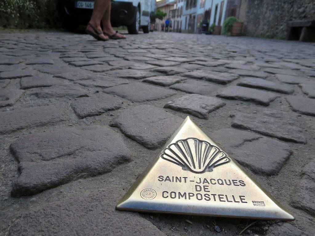 Signs and markers indicate the path of the Camino de Santiago trail. (Beth Jusino)