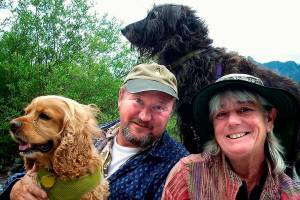 Andy Sudkamp, shown here with his wife, Mary Ann and their dogs, was an Everett High School biology teacher who died during a 2015 hiking trip at the Grand Canyon. The Evergreen Arboretum & Gardens Society seeks $10,000 in donations for a sculpture at Legion Park to commemorate his life. (Contributed Photo)
