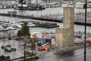 Once completed, the Grand Avenue Bridge will provide a pedestrian pathway to Port of Everett. The western tower for the bridge, pictured in the lower right side, will contain an elevator and utility shaft. (Lizz Giordano / The Herald)
