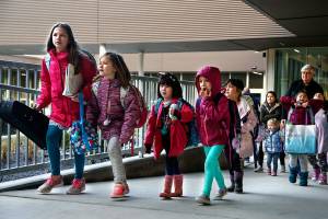 Students arriving for the first day at the new Madrona K-8 school in Edmonds follow teachers to their new classrooms. (Dan Bates / The Herald)