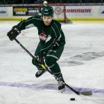 Zach Andrusiak skates with the puck during Silvertips practice on Jan. 2 in Everett. (Olivia Vanni / The Herald)