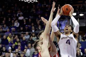 Crisp scores 23, Washington beats rival Washington State