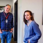 Sheridan Moore chats with EvCC English instructor Steven Tobias in Gray Wolf Hall. Last spring, Moore took Tobiass English composition class in which the research topic was human trafficking. It is partly due to his class that she chose labor trafficking as a project to earn the Girl Scouts Gold Award. (Dan Bates / The Herald)
