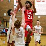 Marysville Pilchucks RaeQuan Battle goes up for a layup during a Wesco 3A boys basketball game Monday in Mountlake Terrace. Battle scored 25 points in the Tomahawks 51-42 win over the Hawks. (Andy Bronson / The Herald)