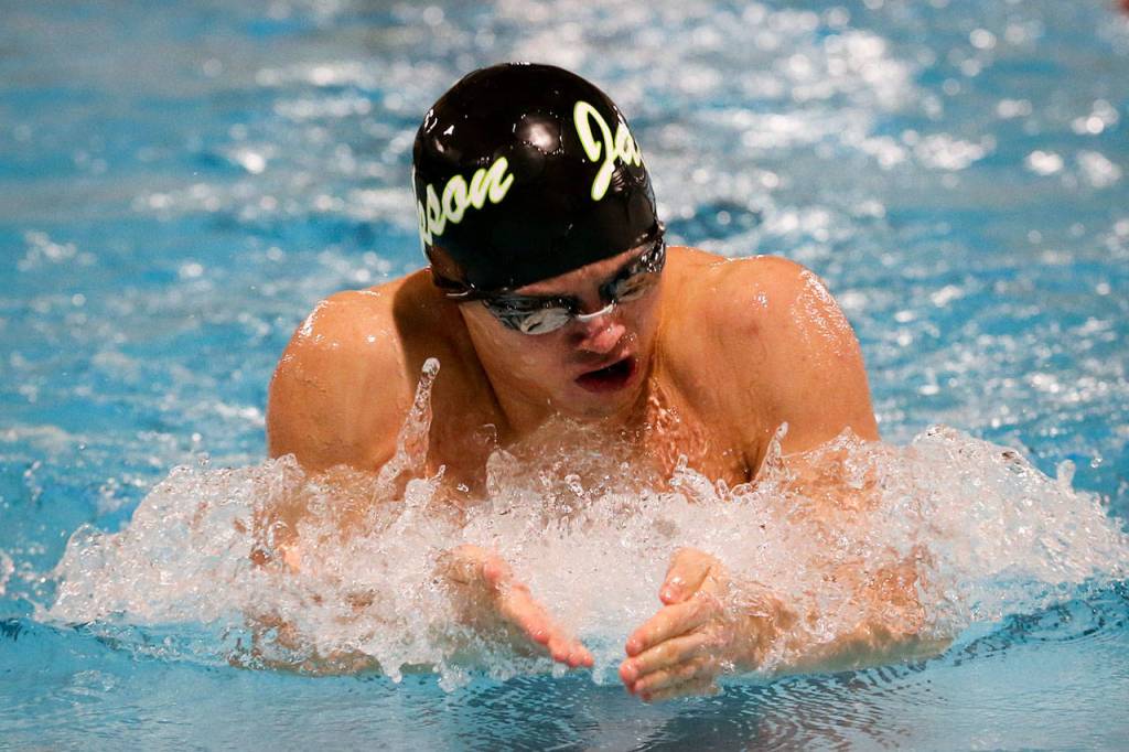 Jacksons Justin Limberg competes in the 100 breaststroke during a meet against Shorewood on Jan. 8, 2019, at WEST Coast Aquatics in Mill Creek. (Kevin Clark / The Herald)