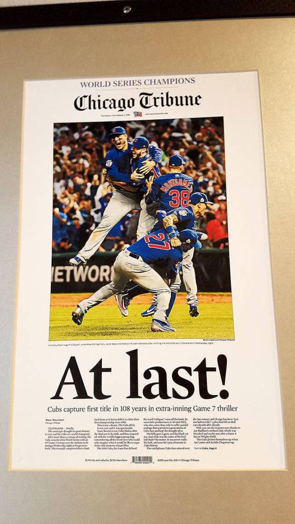 The coffee shops interior is decorated in a newsroom theme, which includes copies of famous newspaper front pages. (Sharon Salyer/The Herald)