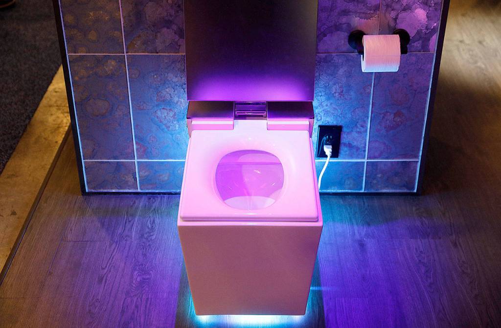 The Numi 2.0 intelligent toilet with Amazon Alexa on display at the Kohler booth at CES International. Numi will respond to voice commands to raise or lower the lid  or to flush. (John Locher/Associated Press)
