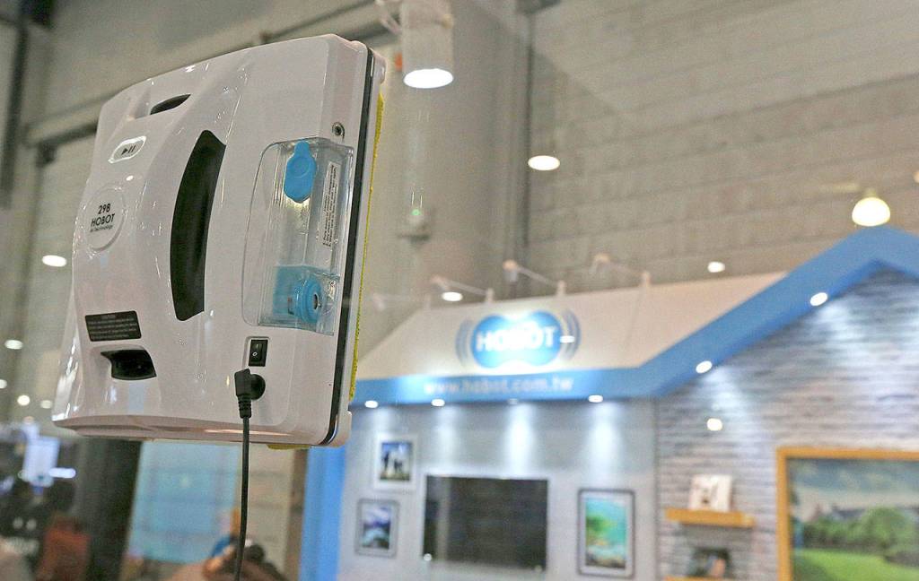 The Hobot-298 window cleaning robot is equipped with brand new AI technology that replicates human movement to clean windows. You can either use the remote controller or the your smartphone and HOBOT app to control it. (Ross D. Franklin/Associated Press)