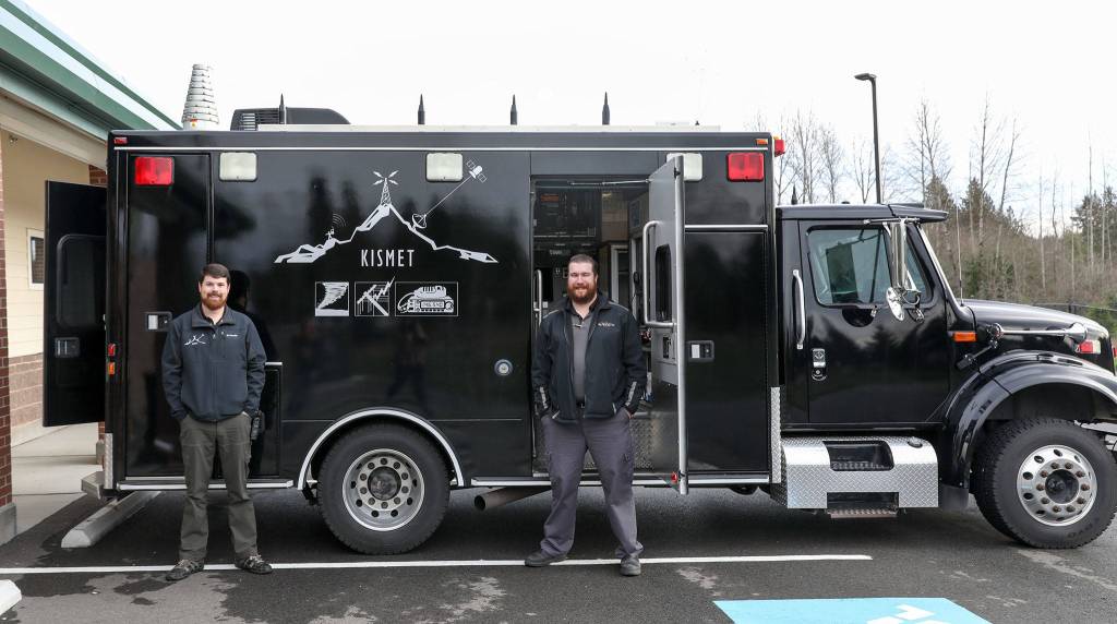 Kyle Burgess (left) and Matt Benjamin were named city of Marysville volunteers of the month in November. The Kismet is a mobile communciation hub the pair has outfitted. (Lizz Giordano / The Herald)