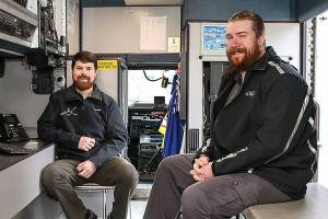 Longtime friends, Kyle Burgess (left) and Matt Benjamin are helping the city of Marysville develop a communication system for emergency response. (Lizz Giordano / The Herald)