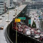 Southbound traffic backs up as northbound drivers cruise on with ease on the Highway 99 viaduct on Jan. 8 in Everett. (Andy Bronson / The Herald)
