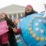 Charles Dharapak / Associated Press file                                Margot Riphagen of New Orleans, Louisiana, wears a birth control pills costume during a protest in front of the U.S. Supreme Court in Washington on March 25, 2015. (AP Photo/Charles Dharapak, File)