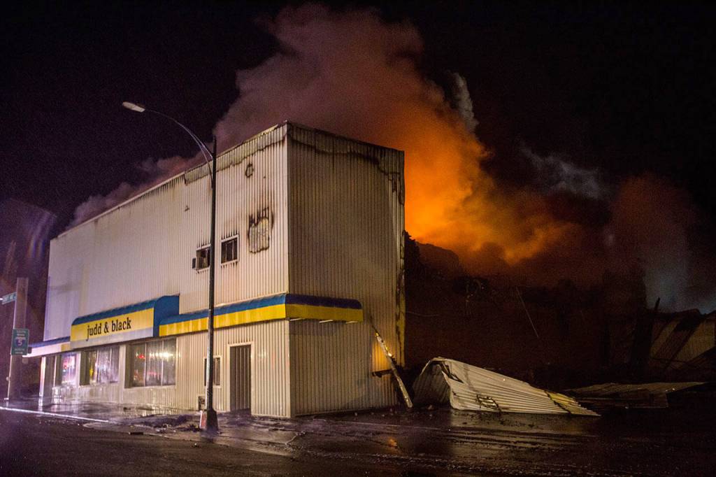 The Judd & Black appliance store burns on Sept. 21, 2018, in Everett. (Olivia Vanni / Herald file)