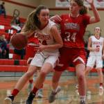 Smohomishs Maya DuChesne (left) drives against Stanwoods Taylor Murphy during a Wesco 3A girls basketball game Thursday in Snohomish. DuChesne scored a game-high 16 points in the Panthers 55-38 win. (Kevin Clark / The Herald)