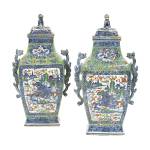 A pair of clobbered Chinese urns decorated with blue-and-white pictures of houses and a river were overpainted with colored flowers, leaves and a cracked ice design. The pair sold for $5,750. (Cowles Syndicate Inc.)
