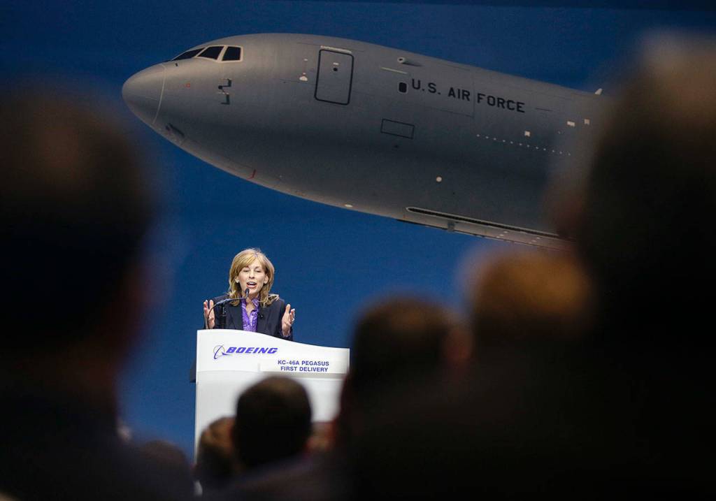 Leanne Caret, president and CEO of Boeing Defense, Space & Security, talks to employees and guests at the KC-46 Pegasus delivery event in the Boeing factory at Paine Field in Everett on Thursday. (Andy Bronson / The Herald)