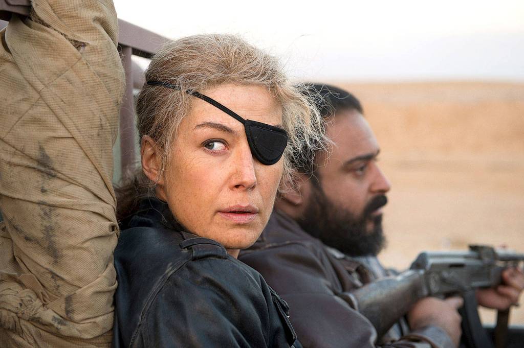 Rosamund Pike worked with coaches to drop her voice an octave and adopt a Long Island accent for her role in A Private War. (Paul Conroy / Aviron Pictures)                                Rosamund Pike in A Private War. MUST CREDIT: Paul Conroy, Aviron Pictures